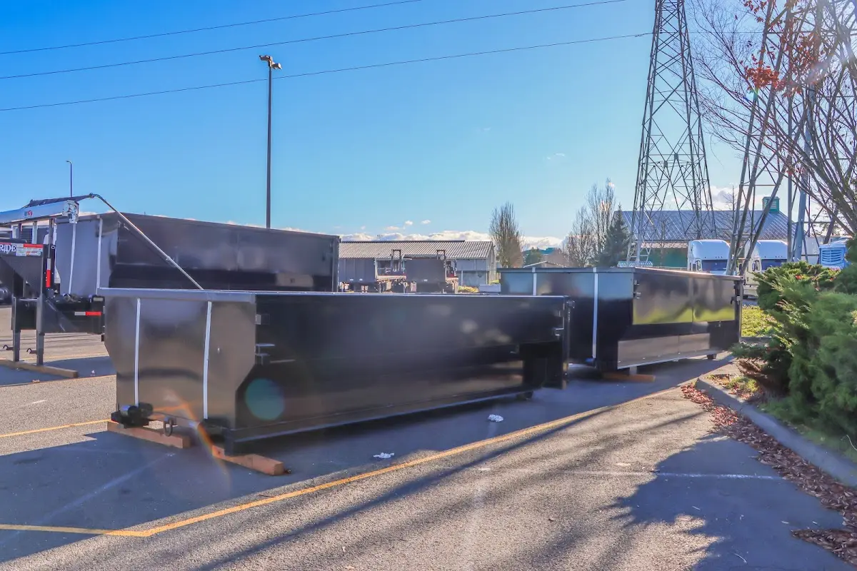 Roll-off dumpster ready for waste disposal at job site for Construction Dumpster Rental in Halls
